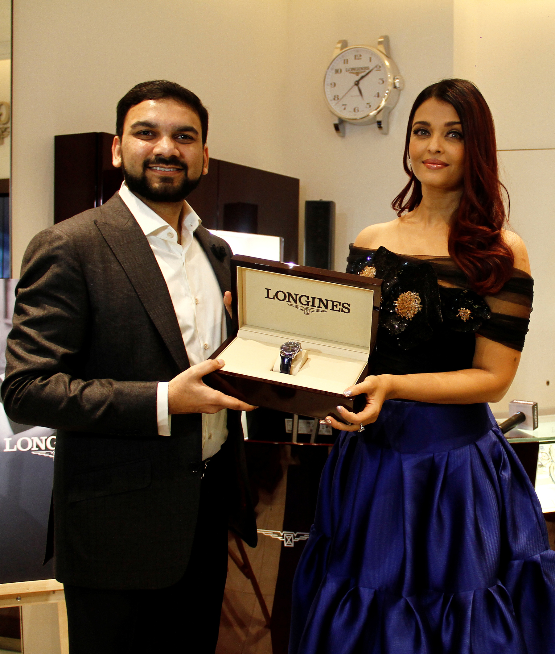 Mr. Sharjeel Khan, Director, Zimson Times Pvt. Ltd. presents the new Longines Master Collection blue dial to Longines Ambassador of Elegance, Aishwarya Rai Bachchan during the inauguration of the new Longines Boutique at U.B. City, Bengaluru.