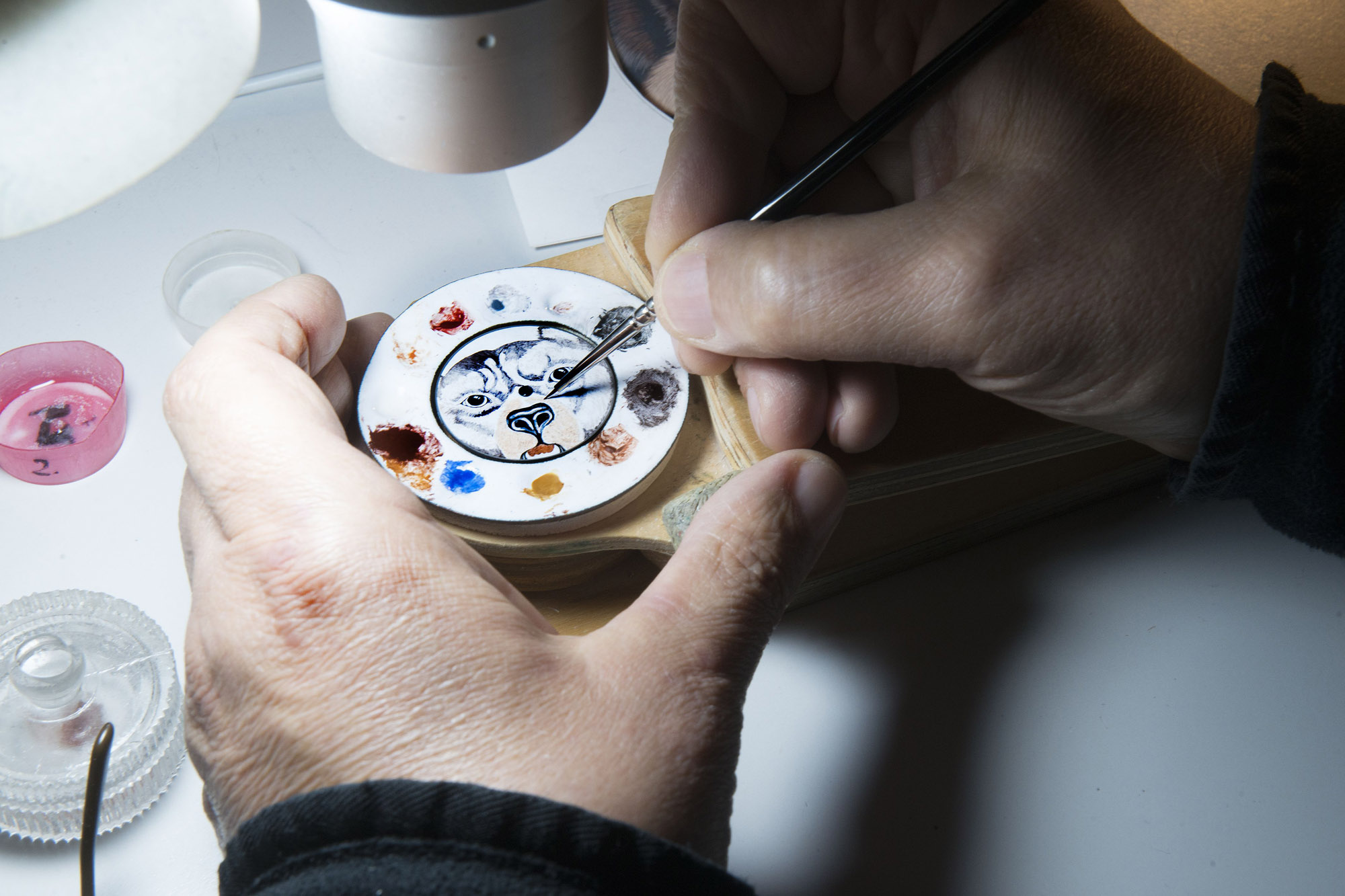 With each pigment applied to the white gold dial, the animal's expression becomes more daunting.