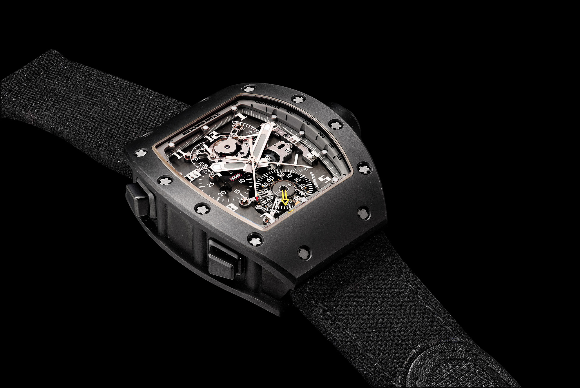 An important and unique titanium tonneau-shaped split seconds chronograph tourbillon wristwatch, RM008, circa 2006