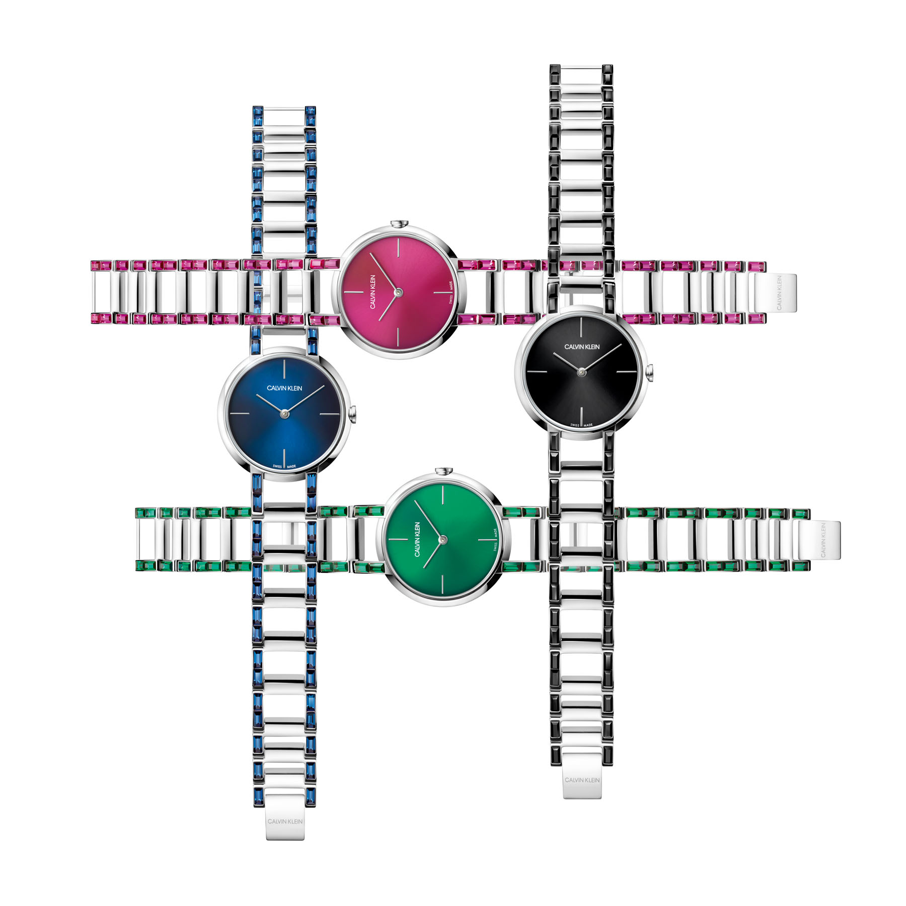 Geometric shapes entwined with a jewellery-inspired bracelet, calling out to the urban American roots. The clean dial is offered in five versions – silver, black, fuchsia pink, Montana blue and emerald green - each of which is framed by a stainless steel articulate bracelet embedded with matching Swarovski stones.