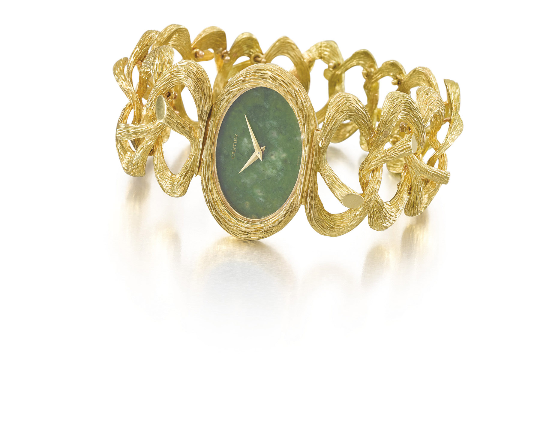 Piaget. A fine and very elegant lady’s 18K gold and jade bracelet watch, retailed by Cartier, made in 1969 Estimate CHF 25,000 – 35,000