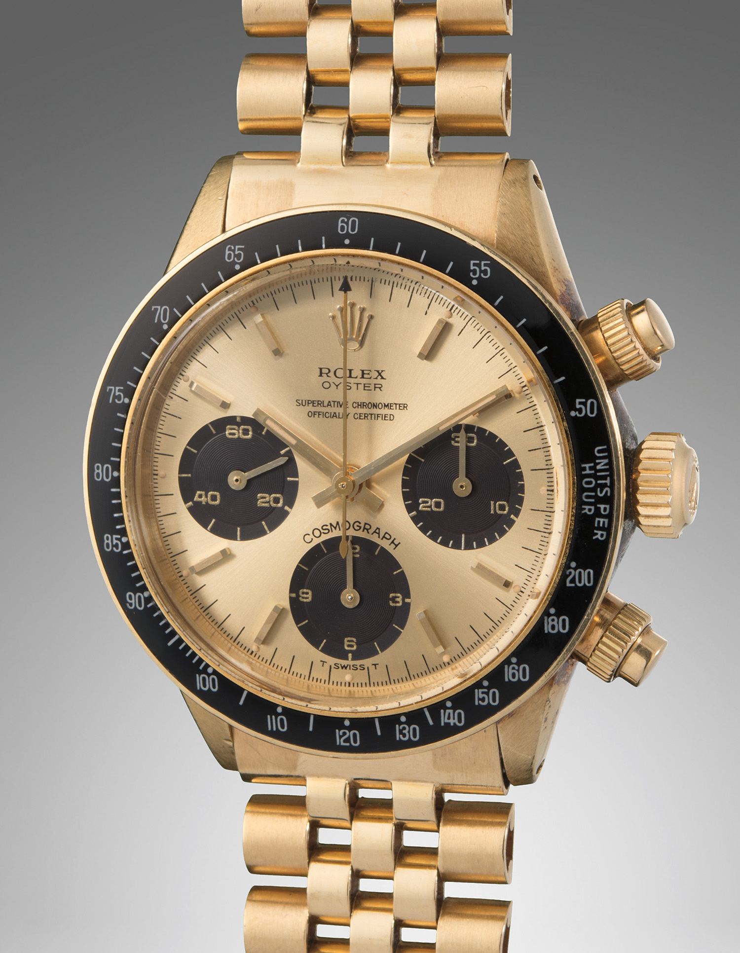 An important yellow gold chronograph wristwatch with a champagne dial displaying “Oyster” designation and “floating scripts”, sold for $225,000.