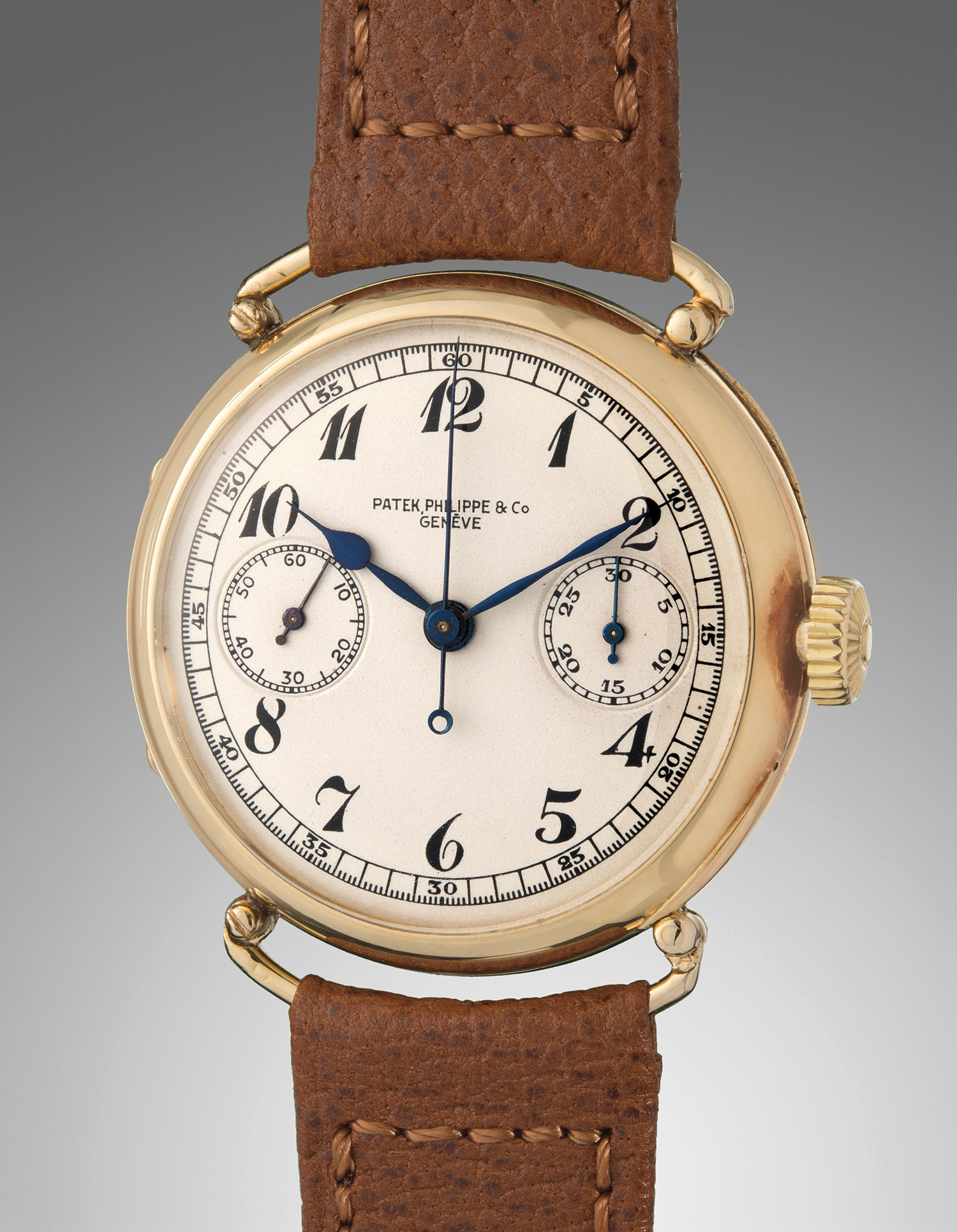 An extremely rare yellow gold single button chronograph wristwatch with Breguet numerals. Sold for $337,500.