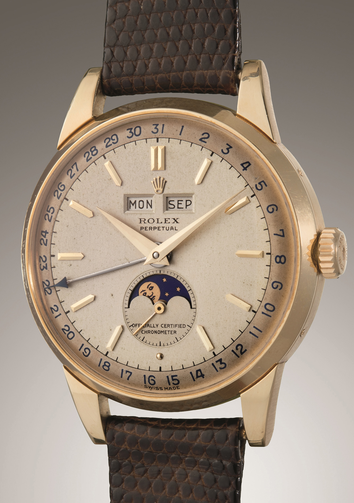 A very well-preserved yellow gold triple calendar wristwatch with a two tone dial sold for $350,000.