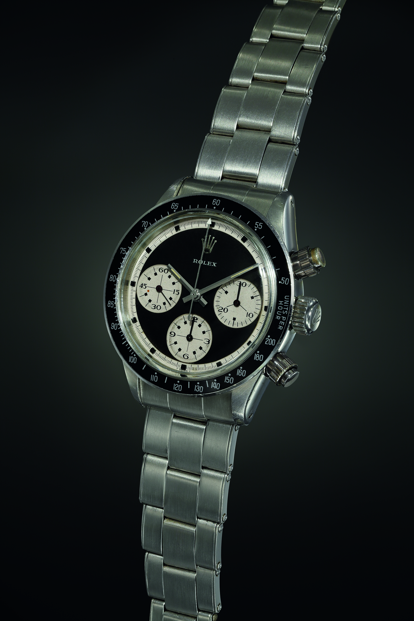 A highly interesting and historically important stainless steel chronograph wristwatch with most probably unique black and white ‘pre-Paul Newman’ style dial, featuring oversized registers and black outer seconds marks on white track. Realised CHF 3,012,500.