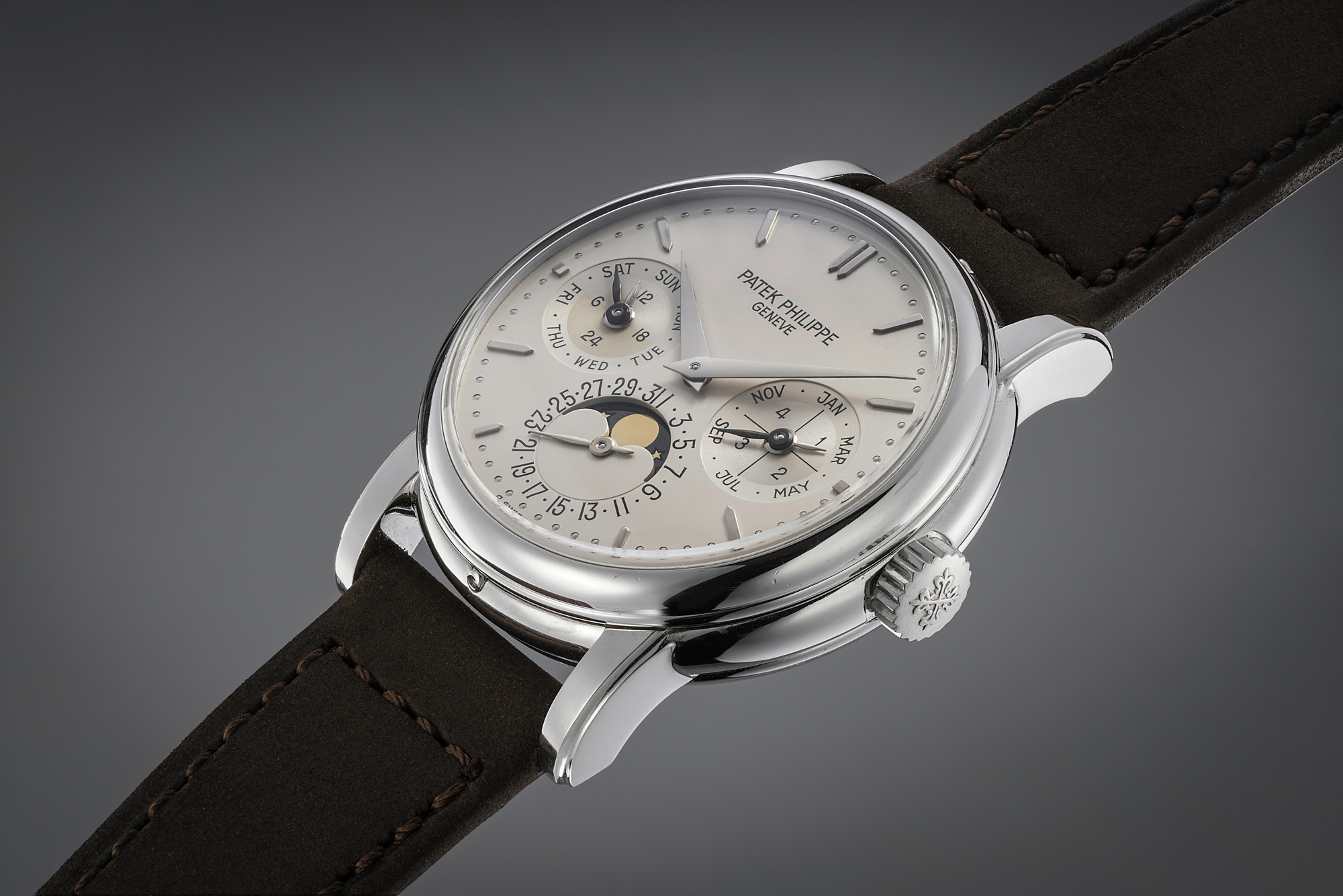 An incredibly rare and attractive platinum minute repeating perpetual calendar wristwatch with phases of the moon.