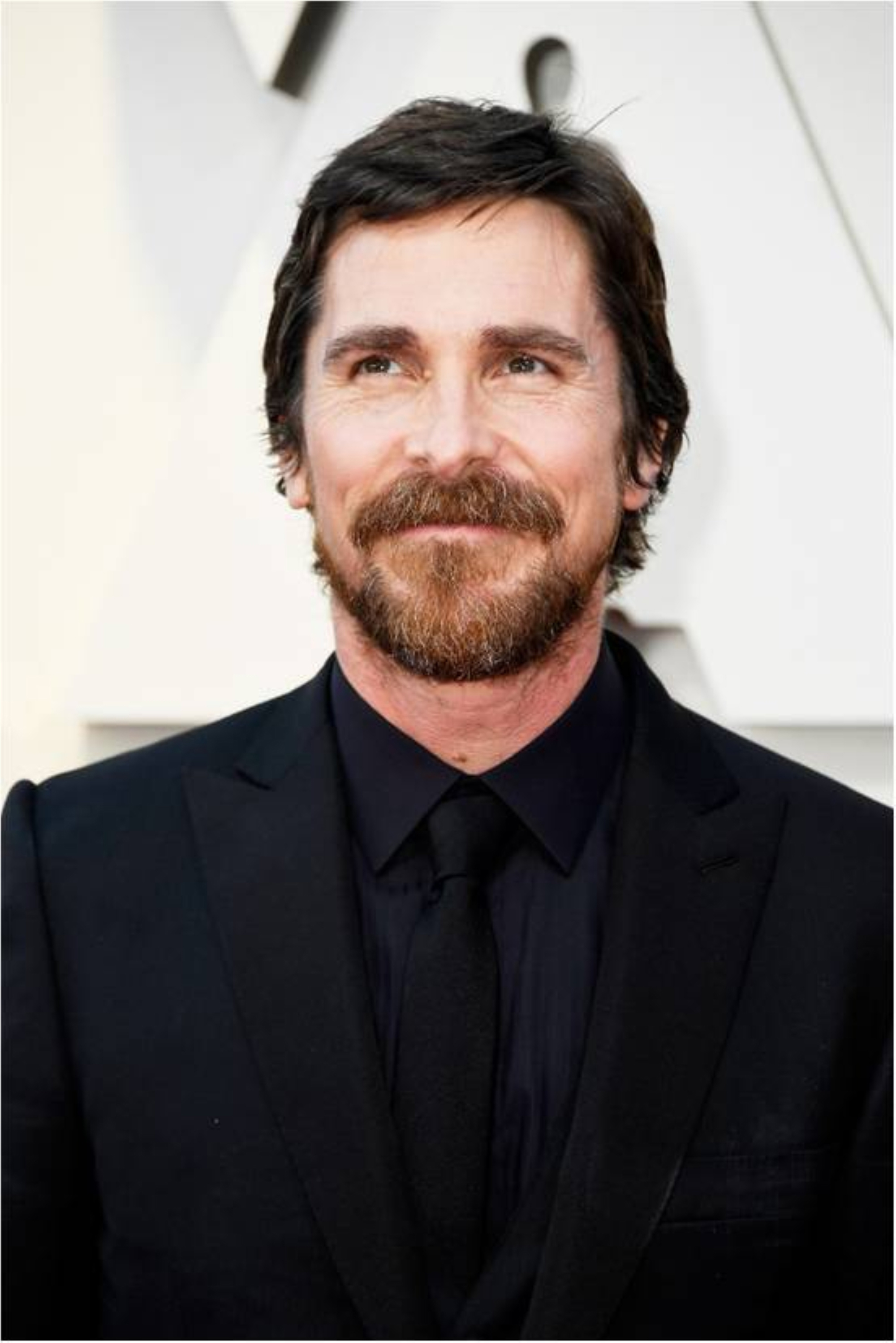 Christian Bale wearing the Santos de Cartier