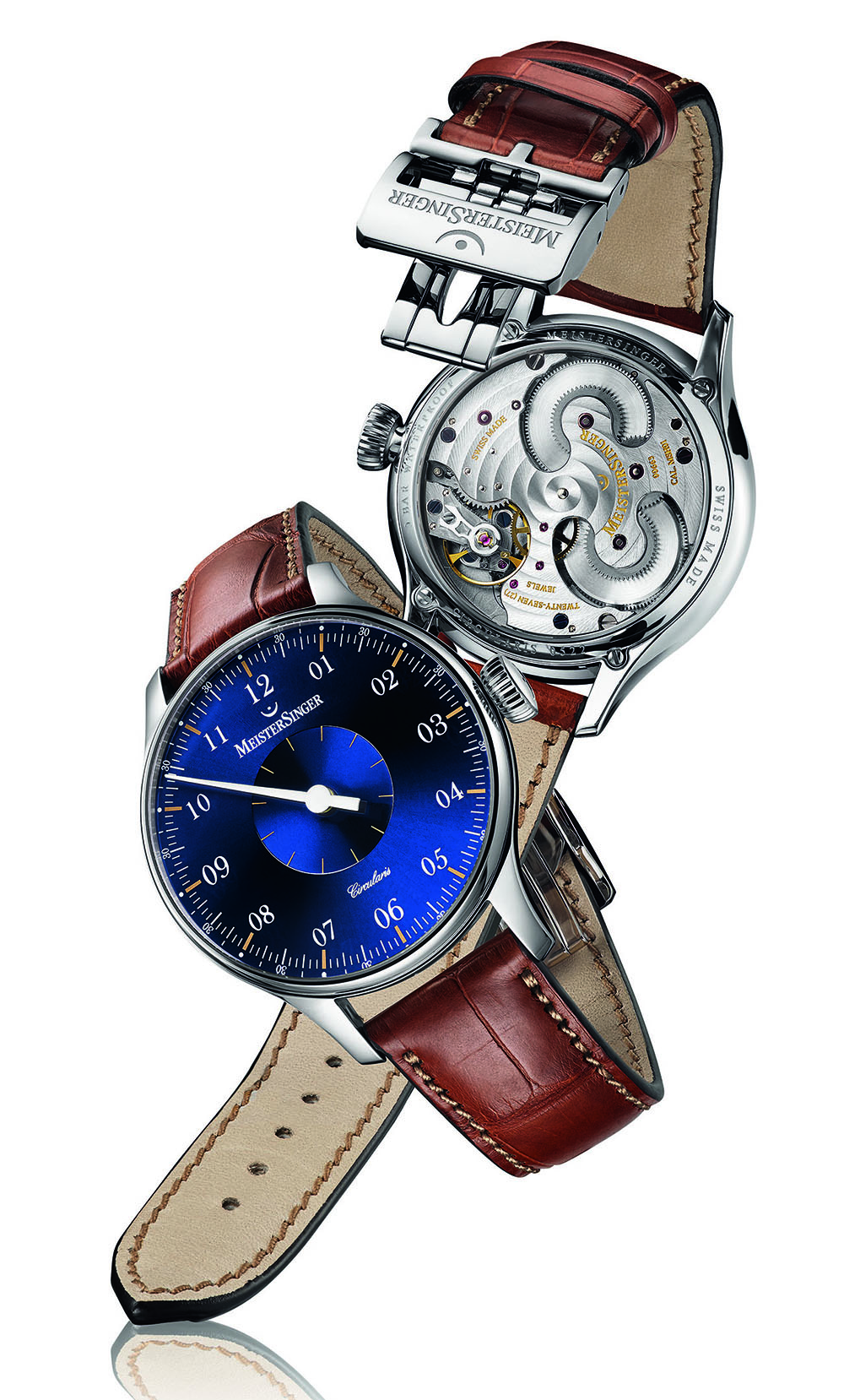 REFERENCE: CC108 MOVEMENT: In-house Caliber MSH01, hand-wound, two barrels, diameter = 32.7 mm, height = 5.4 mm, 28,800 vph, 27 jewels, five-day power reserve CASE: Stainless steel, diameter = 43 mm, height = 12.5 mm, curved sapphire crystal with non-reflective coating on the inside, sapphire caseback secured with four screws, water-resistant to 50 meters STRAP AND CLASP: Alligator strap with stainless-steel double folding clasp VARIATIONS: Ivory or silver-coloured dial