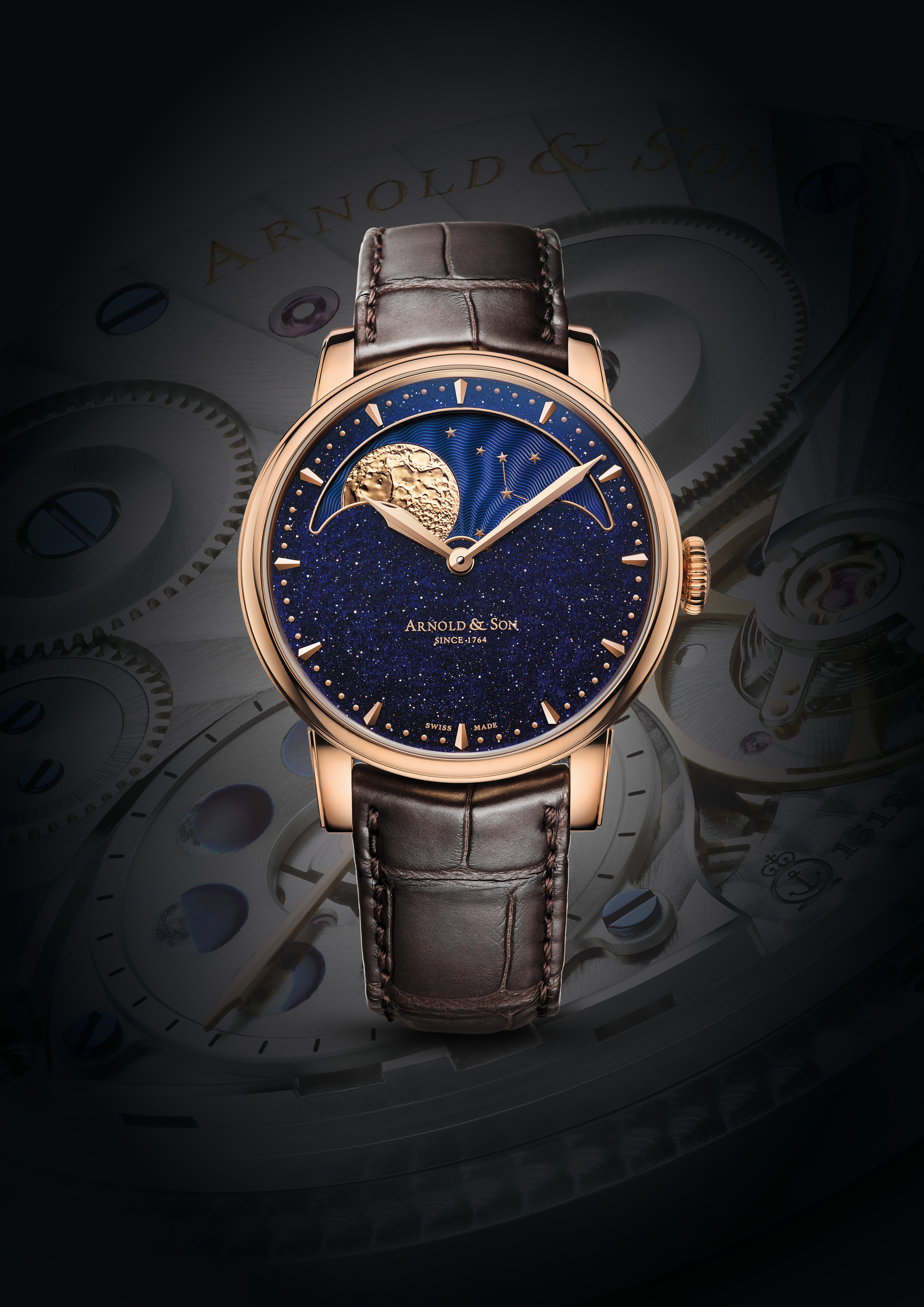 The 18K red gold mechanical timepiece comes in a limited edition of 28 pieces. Featuring a blue aventurine dial with a solid gold moon phase, the 42mm piece comes with an exclusive Arnold & Son mechanical hand-wound calibre A&S1512 developed especially for the moon phase complication and is equipped with a 90-hour power reserve. Resting on a hand-stitched alligator strap, the new HM Perpetual Moon Aventurine is priced at CHF 31,900 (approx.).