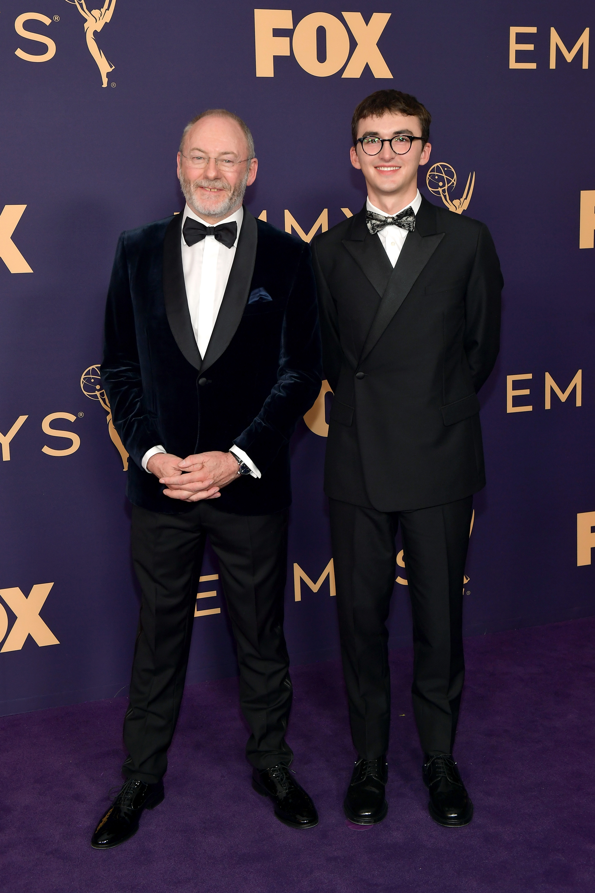 Liam Cunningham (L) and Isaac Hempstead Wright attend the 71st Emmy Awards (Photo by Matt Winkelmeyer/Getty Images)