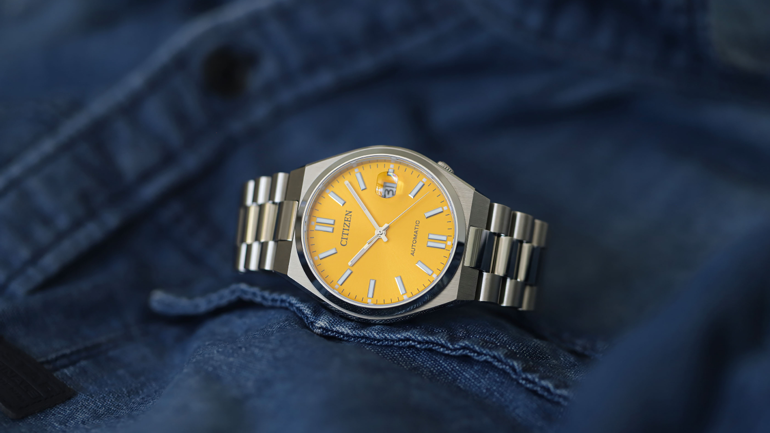 Citizen NJ0150-56Z with yellow dial